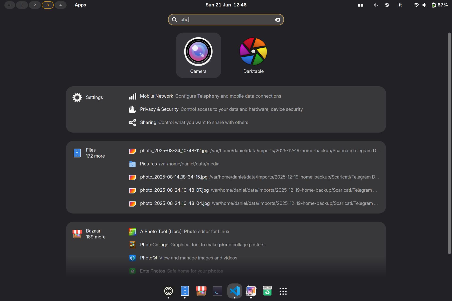 GNOME Activities with search open showing Margine apps and dock